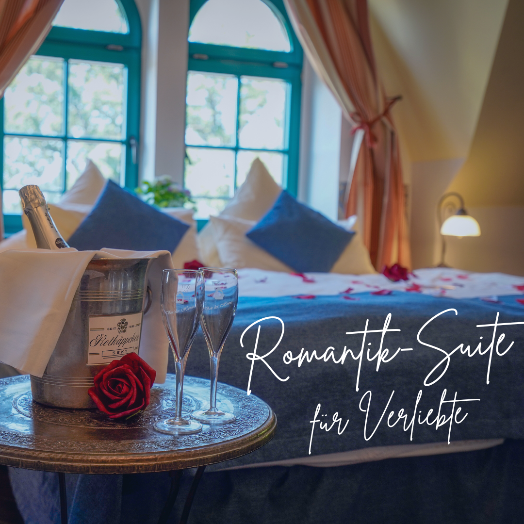 romantisch dekorierte Suite mit Sekt